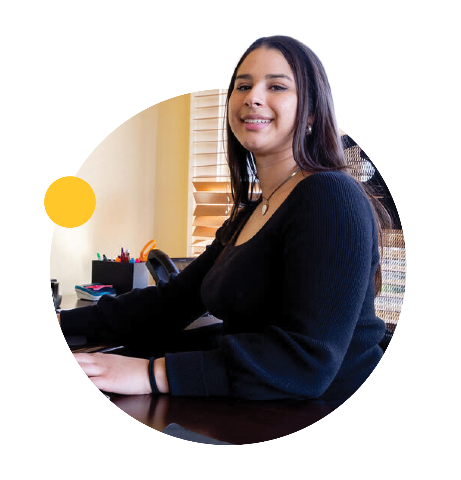 An ASU English student works at her internship.