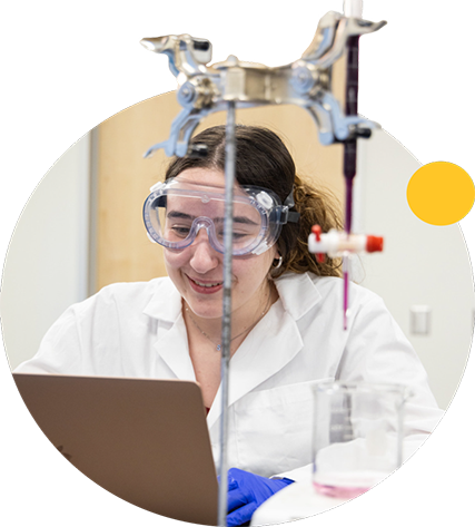 An ASU student performs an experiment in a chemistry lab.