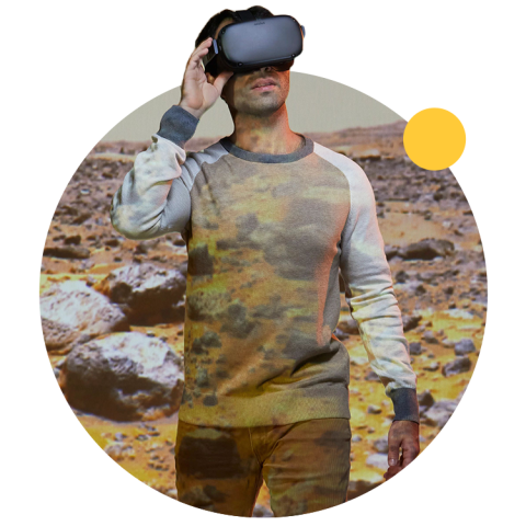 An ASU student uses VR to explore a desert environment.